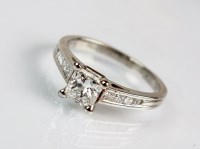 Lot 295 - A platinum single stone princess cut diamond...