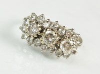 Lot 306 - An 18ct white gold diamond cluster ring,...
