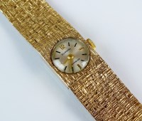 Lot 318 - A lady's 9ct gold Gilroyal bracelet watch, the...
