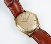 Lot 323 - A gentleman's 9ct gold Omega wristwatch, the...