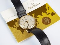 Lot 324 - A gentleman's 9ct gold Omega wristwatch, the...
