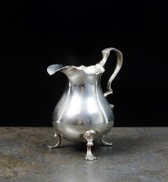 Lot 9 - A mid 18th century silver cream jug, marks...
