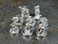 Lot 27 - A harlequin set of eight silver mounted...