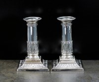 Lot 52 - A pair of Edwardian short silver candlesticks,...