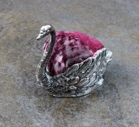 Lot 80 - A continental novelty silver pin cushion in...