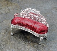 Lot 97 - An Edwardian novelty silver pin cushion in the...