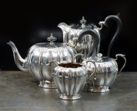 Lot 105 - A four piece silver tea service, L.P., London...