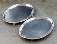 Lot 115 - A pair of George III silver waiters, John...