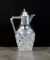 Lot 121 - An Edwardian silver mounted glass claret jug,...