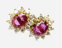 Lot 153 - A pair of ruby and diamond cluster earrings,...