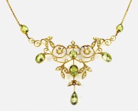 Lot 168 - An early 20th century peridot and seed pearl...