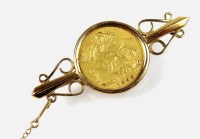 Lot 189 - An 1899 half sovereign within 9ct gold brooch...