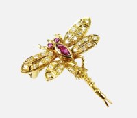 Lot 195 - An 18ct gold ruby and diamond set dragonfly...