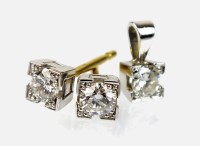 Lot 237 - A pair of 18ct gold diamond set stud earrings,...