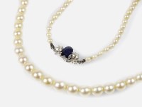 Lot 240 - A graduated cultured pearl necklace with...