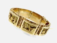 Lot 247 - A yellow metal decorative panel bracelet,...