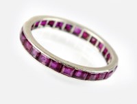 Lot 265 - A ruby full hoop eternity ring, designed as a...