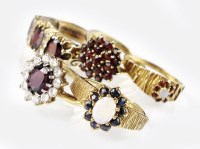 Lot 275 - A 9ct gold opal and sapphire dress ring,...