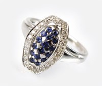 Lot 286 - A 14ct white gold sapphire and diamond swivel...