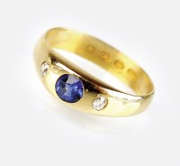 Lot 294 - A Victorian 22ct gold three stone sapphire and...