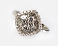 Lot 309 - An 18ct white gold diamond cluster ring,...