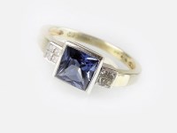 Lot 320 - A sapphire and diamond dress ring, designed as...