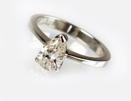 Lot 323 - A single stone pear shaped diamond ring, claw...