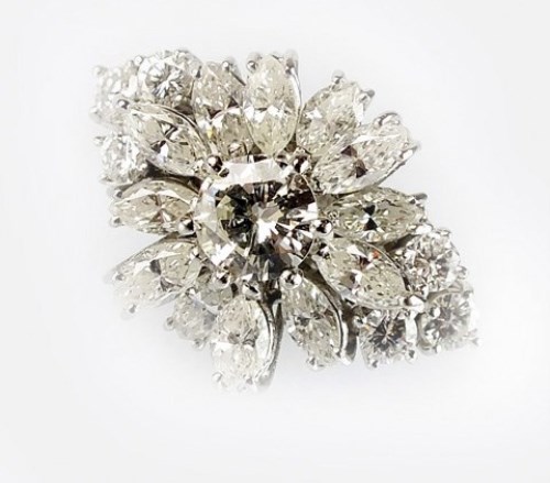Lot 325 - A diamond set dress ring, designed as a...