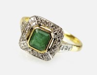 Lot 341 - An 18ct gold emerald and diamond cluster ring,...