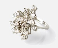 Lot 345 - An 18ct white gold diamond dress ring,...