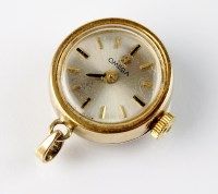 Lot 356 - A Lady's 9ct gold Omega pendant watch, the...