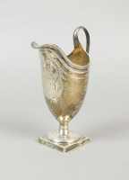 Lot 8 - A George III silver helmet cream jug, London...