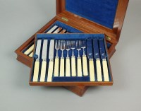 Lot 18 - A cased part set of silver fruit knives and...