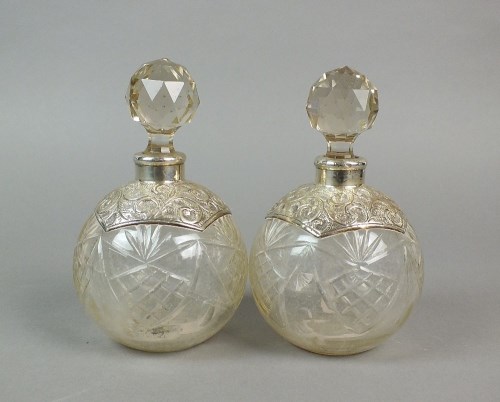 Lot 28 - A pair of early 20th century silver mounted...