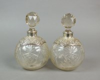 Lot 28 - A pair of early 20th century silver mounted...