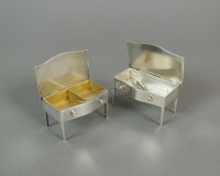 Lot 48 - An Edwardian near pair of novelty silver boxes,...