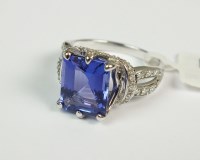 Lot 70 - An 18ct white gold tanzanite and diamond ring,...