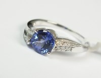 Lot 72 - A 9ct white gold tanzanite and diamond ring...