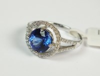 Lot 74 - An 18ct white gold tanzanite and diamond...