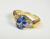 Lot 78 - An 18ct yellow gold tanzanite and diamond...