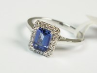 Lot 79 - An 18ct white gold tanzanite and diamond...