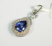 Lot 84 - An 18ct white gold tanzanite and diamond...