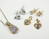 Lot 88 - A pair of 18ct white gold tanzanite and...