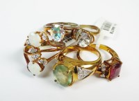 Lot 106 - A 9ct yellow gold opal and white sapphire...