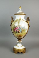 Lot 261 - A large Sevres style porcelain and gilt metal...