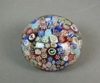 Lot 278 - A small Baccarat millefiori glass paperweight,...