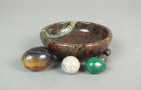 Lot 321 - A red and green serpentine bowl, together with...