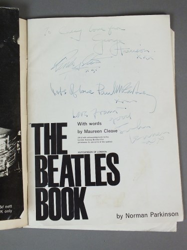 Lot 334 - A set of Beatles signatures contained in a...
