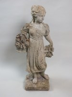 Lot 341 - A composite stone figure of a flower girl,...