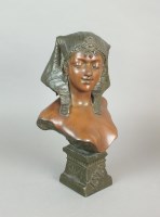 Lot 344 - A bronze effect bust of the Egyptian Goddess...